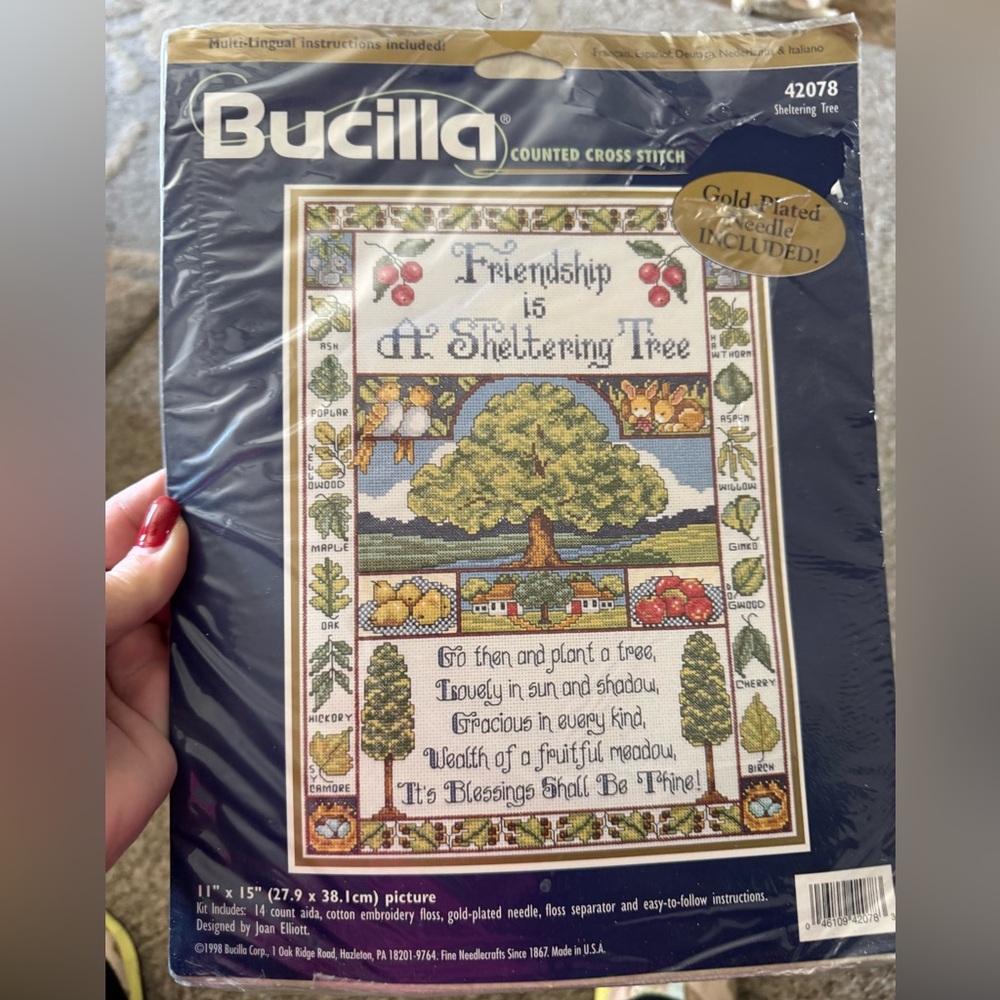 Bucilla cross stitch set with golden needle New